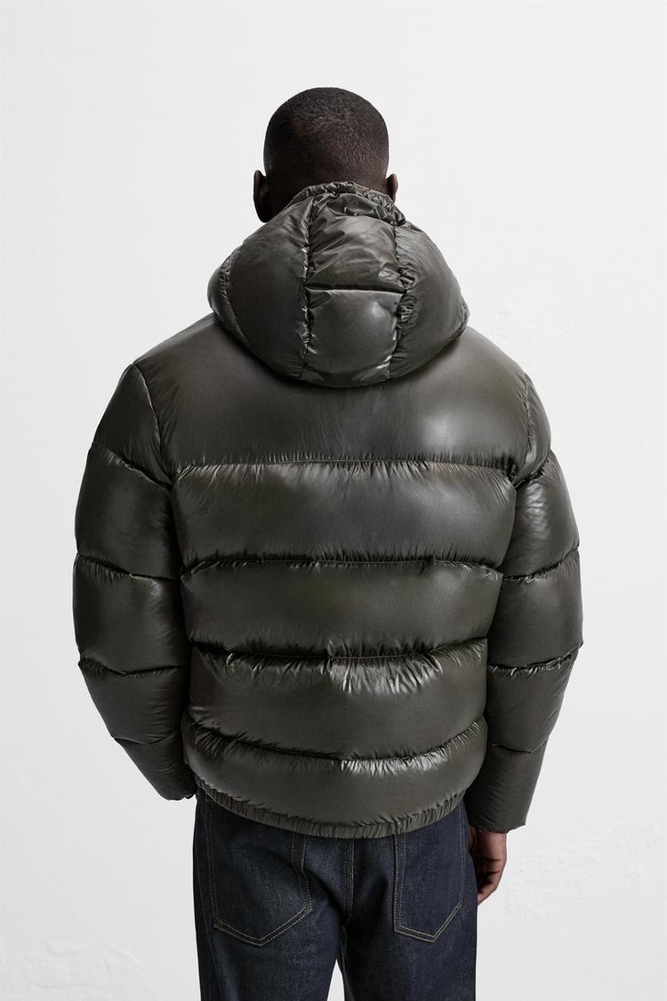 100% Daunen-Pufferjacke mit Federn